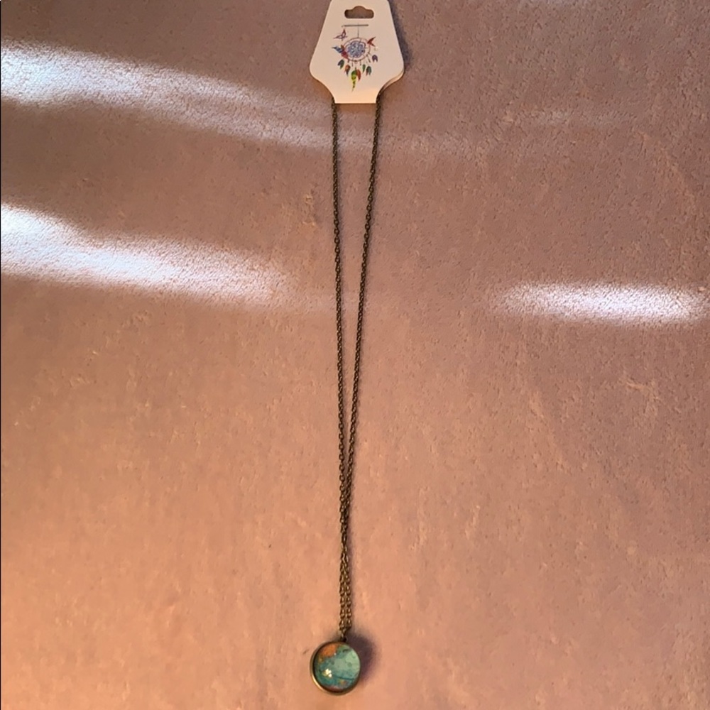 NWT Glow in The Dark Globe Necklace
